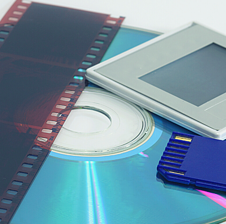 digitalisering van microfiches, video, dia's en film